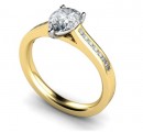 18 Carat Yellow and White gold 7mm x 5mm/6mm x 4mm Pear shaped Diamond and Diamond shoulders