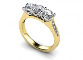 18 Carat Yellow and White gold 3 stone Diamond Ring, (Diamond shoulders)