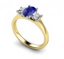18 Carat Yellow and White gold 7mm x 5mm Kanchan. Blue Sapphire and Princess cut Diamond Ring..
